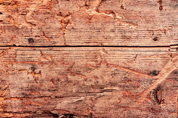Wooden texture with scratches and cracks. It can be used as a background