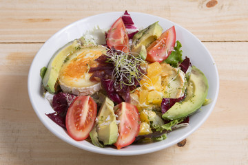 Delicious green salad with goat cheese in the Spanish restaurant.