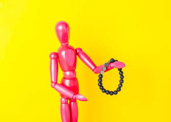 amethyst semiprecious bracelet on pink wooden manikin