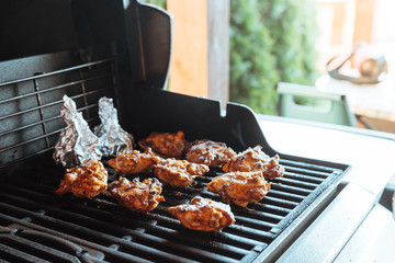 Grilling chicken thighs on a gas grill

