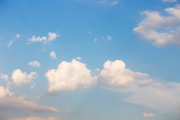 Bright blue sky with white clouds for background or wallpapers