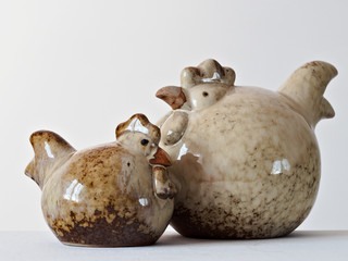 porcelain hens, Easter decoration on a white background
