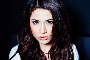 Fototapeta premium model posing in the Studio on a black background