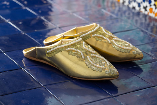 Traditional Moroccan golden festive slippers