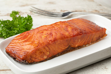 Piece of smoked scandinavian salmon filet close up