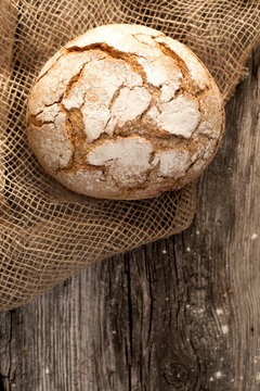 homemade fresh bread on a wooden table