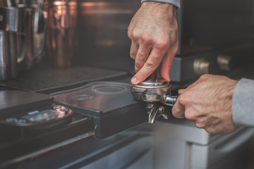 Barista making coffee with latte art. 
black coffee morning on coffee machine