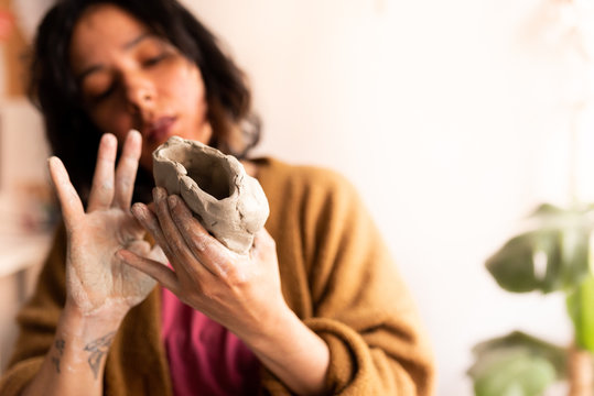 lockdown, young woman working from making pottery and keeping active lifestyle during the virus pandemic, learning new crafts