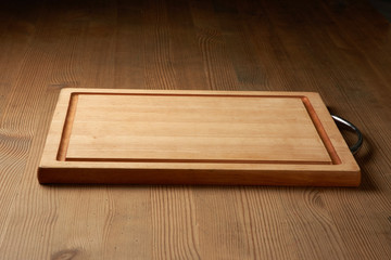 wood cutting board on table