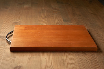 wood cutting board on table
