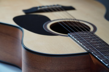 Acoustic guitar placed on a white background,Stay at home