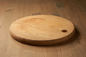 wood cutting board on table