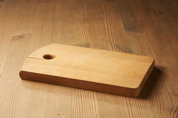 wood cutting board on table