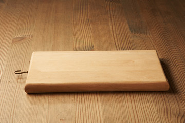 wood cutting board on table