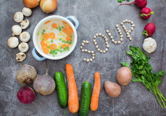 Fototapeta na wymiar Composition with fresh vegetables on grey background, space for text. Pot with vegetables and word 