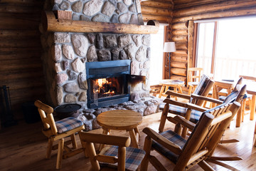 Fototapeta premium nterior of a chalet with seats and fire. Nobody
