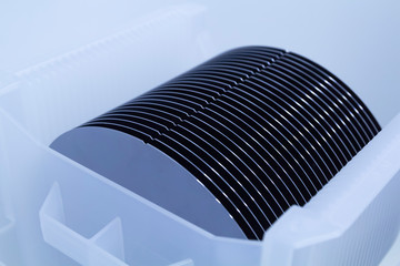 Close up of Silicon wafers grey color prepared for production in a semiconductors manufacturing...