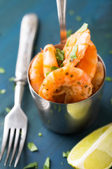 Grilled shrimp with chopped herbs and lime