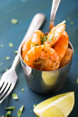 Grilled shrimp with chopped herbs and lime