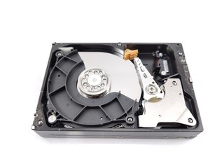 Close up view of a computer hard drive on a white background