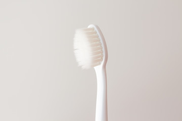  soft and thin conical bristles of a toothbrush close-up on a white background with text space, mock up