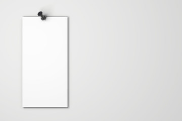 Blank white poster mock up pinned to a plain grey wall. 3D rendering