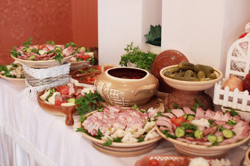 Obraz na płótnie Canvas catering services background with snacks on guests table in restaurant at event party