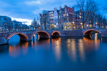 Fototapeta premium City scenic from Amsterdam in the Netherlands at sunset