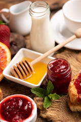 Breakfast with bred, honey strawberries jam