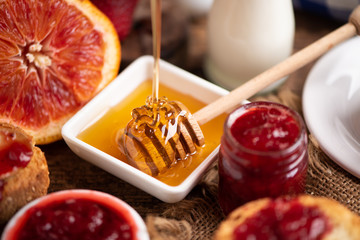 Breakfast with bred, honey strawberries jam