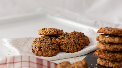 OAT AND BANANA COOKIES ON A WHITE BACKGROUND