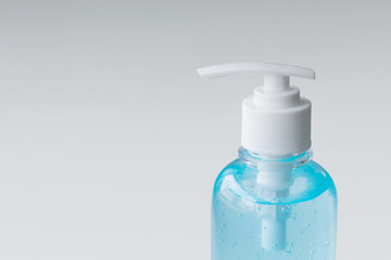 Alcohol gel Sanitizer hand gel cleansers for anti Bacteria and virus on Gray Background, People using alcohol gel to wash hands to prevent COVID-19 virus