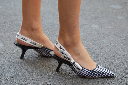 Woman With Dior Houndstooth Shoes On September 21, 2019 In Milan, Italy
