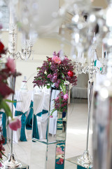 Very beautiful ceremony. classical wedding . The arch is wooden. White flowers.Rite. Bride and groom. Decor. Floristics.