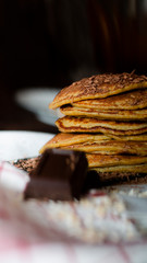 OAT CAKES WITH CHOCOLATE ON A BLACK BACKGROUND