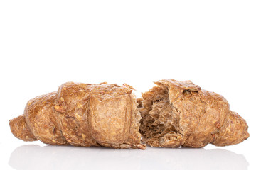 Group of two halves of baked wholegrain croissant isolated on white