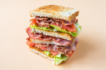 A BLT is a type of sandwich, named for the initials of its primary ingredients, bacon, lettuce and tomato