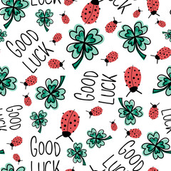 Good luck charms seamless vector pattern. Ladybug, four-leaf clover, Good Luck lettering repeating hand drawn fortune background. Use for New Years, fabrics, packaging