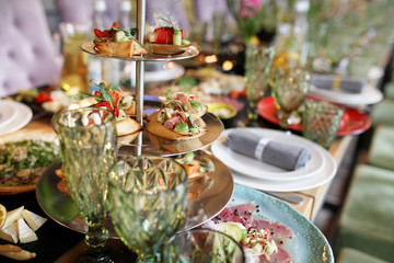 catering services background with snacks on guests table in restaurant at event party