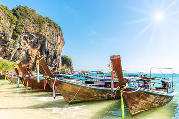 Fototapeta na wymiar Thai traditional wooden longtail boat and beautiful sand beach at Koh Poda island in Krabi province. Ao Nang, Thailand ,Krabi island is a most popular tourist destination in Thailand