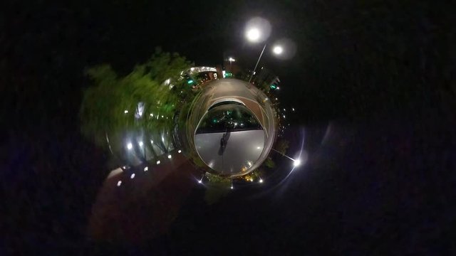 Miniature tiny planet night driving urban city landscape urban sphere distortion effect