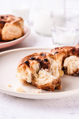 Freshly baked cinnamon buns on morning table