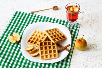 Breakfast. Breakfast concept. Belgian Waffles. Apples and honey. Fruit tea. Compote.