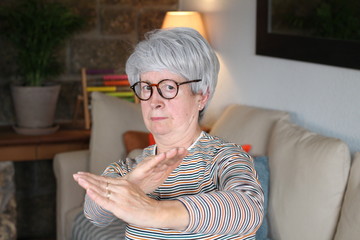 Senior woman in karate position