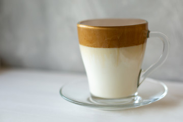 Dalgona coffee is a trendy drink from Korea. Popular whipped coffee with cold milk.