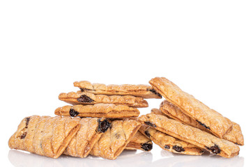 Lot of whole square puff cookie with raisins heap isolated on white