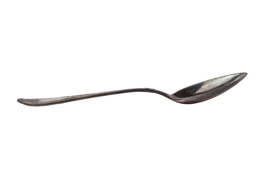 Vintage antique tablespoon of cupronickel. isolated on white background