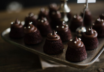 Chocolate muffins with crispy top (selective focus)