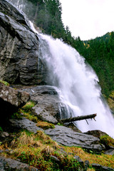 Waterfall in mountains.