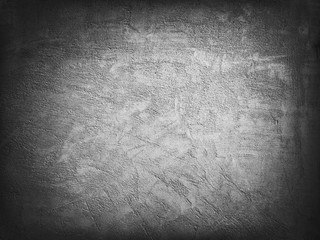 Black white background. Grunge background with cement texture. Rough grainy concrete wall surface.